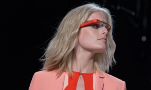 Pink Google glass introduced by a model